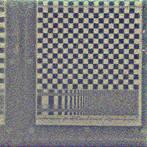 2D slice of the hyperfan-filtered scene. The depth of field of this image is wide, including most of the space between the camera and the checkerboard. The noise has been significantly attenuated, without degrading the sharpness of the checkerboard. 